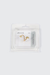 Twisted Moon Star Navel Piercing